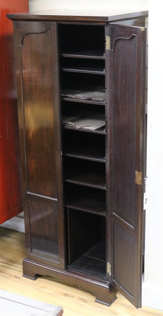 A 1920s mahogany two door sheet music cupboard W.51cm